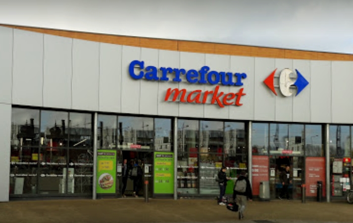 Signalétique vitrine pour supermarché Carrefour Market Le Mans