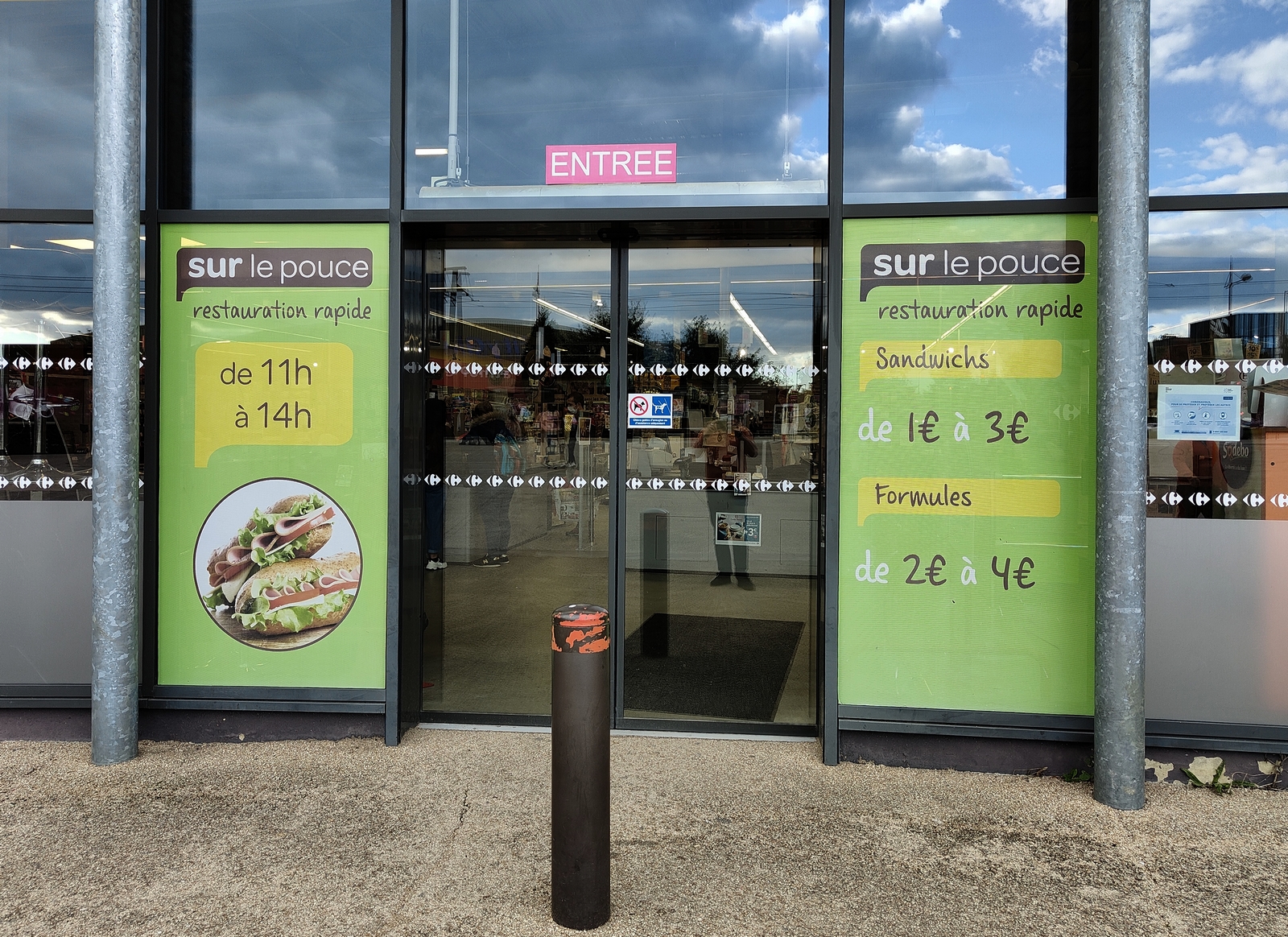 Signalétique vitrine pour supermarché Le Mans